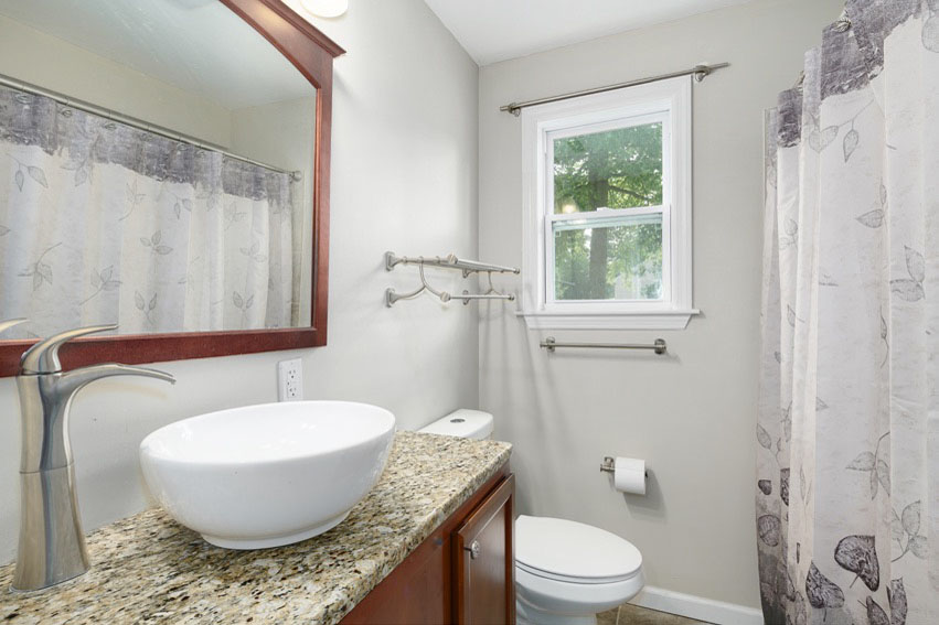 updated Bathroom with shower at Hi Nella Sober Living Home for Men