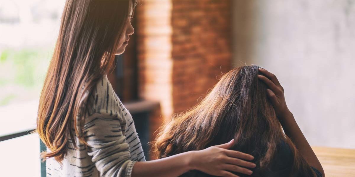 Consoling distraught women asking do I need sober living