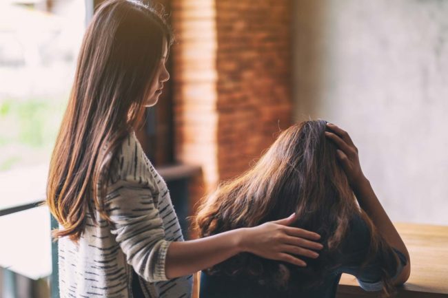 do-I-need-sober-living Consoling distraught women asking do I need sober living