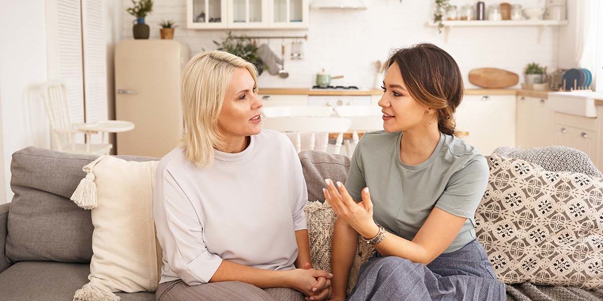 does my loved one need sober living two women on couch discussing does my loved one need sober living