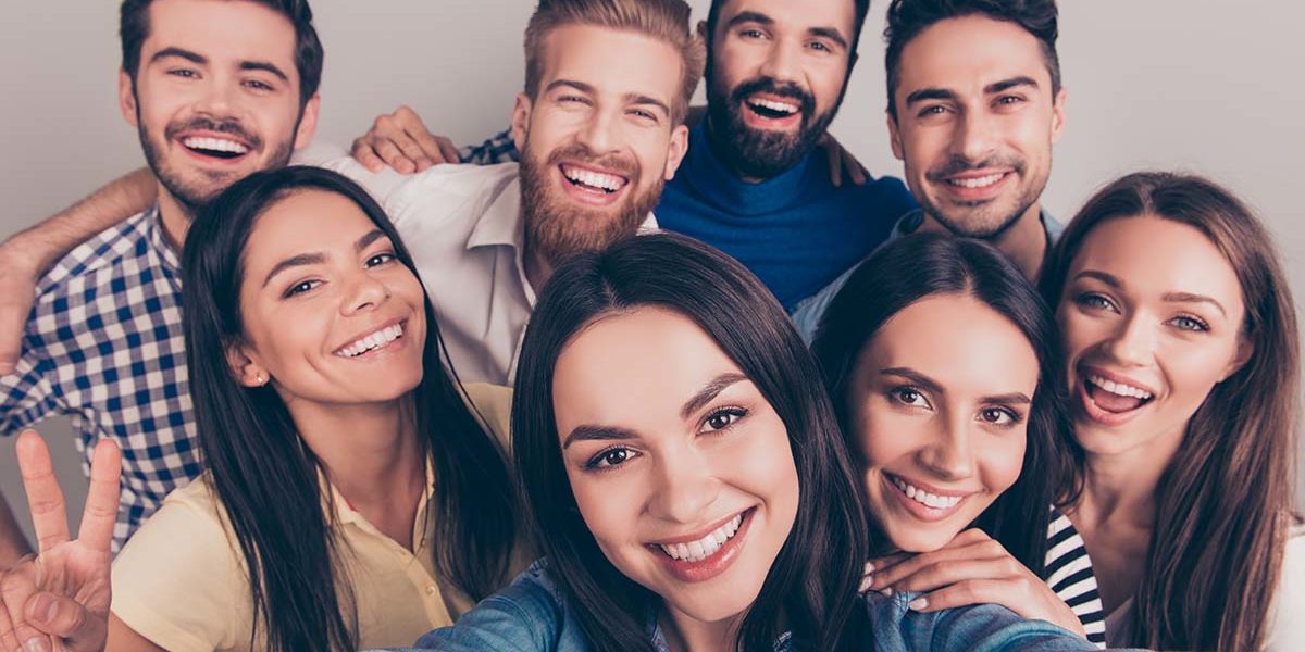 a group taking a selfie sober living myths