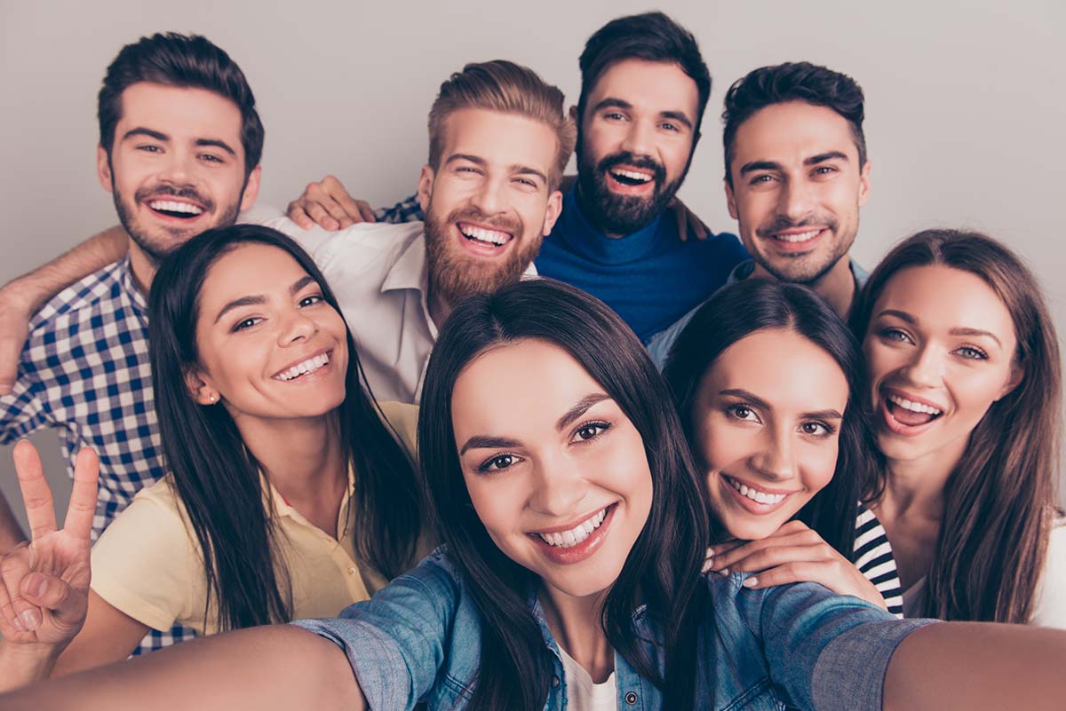 a group taking a selfie sober living myths