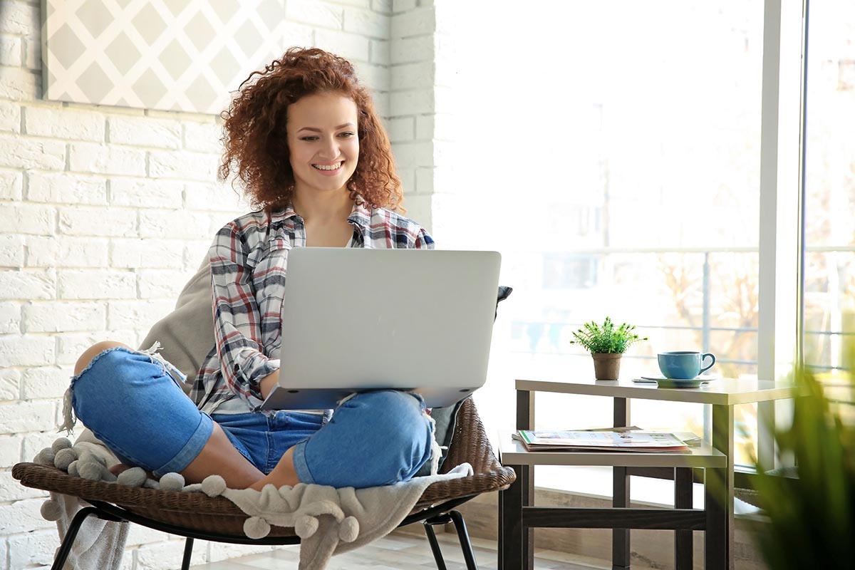 woman on her laptop knowing How to Find a Sober Living Home