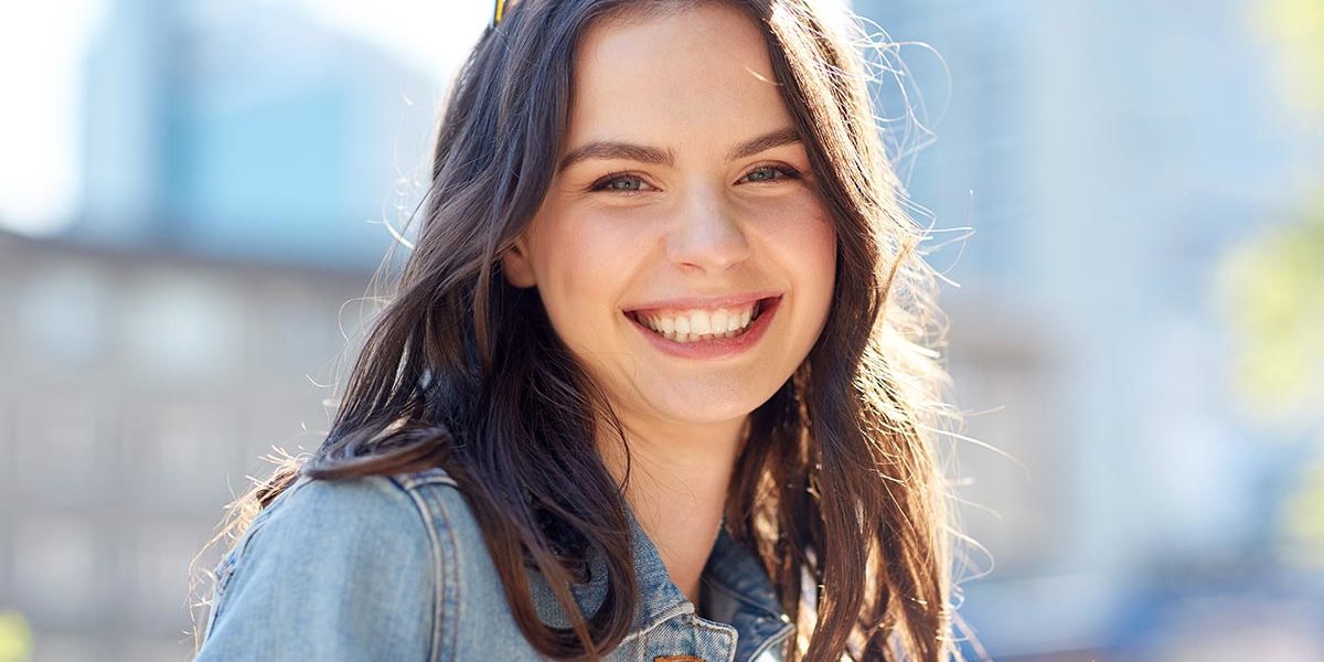 happy smiling young woman on summer city street happy smiling young woman on summer city street staying sober