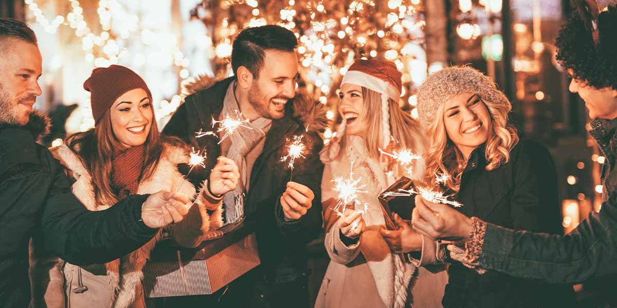 group of friends celebrating with sobriety gifts