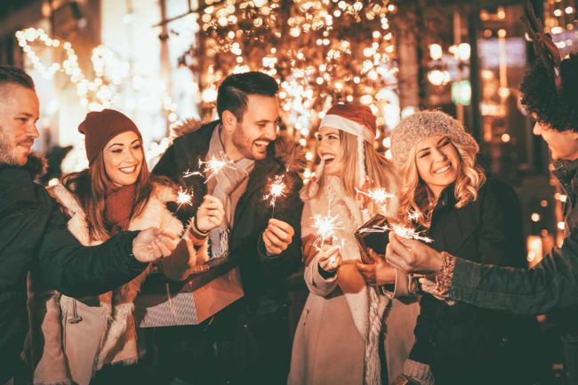 group of friends celebrating with sobriety gifts