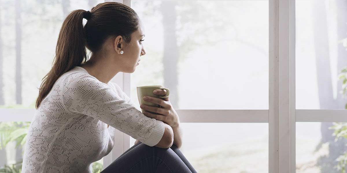 DH_Blog_How-to-Deal-With-Homesickness-in-Sober-Living Woman Dealing With Homesickness At Sober Living Home